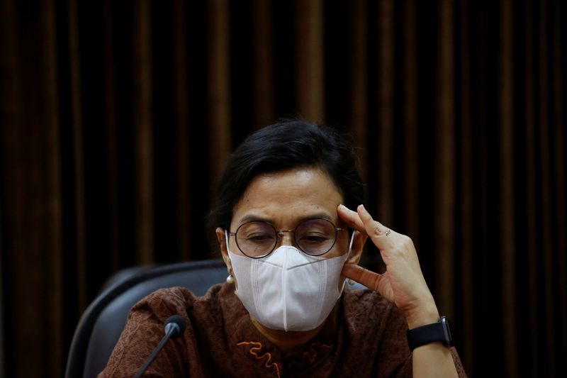 FILE PHOTO: Indonesian Finance Minister Sri Mulyani wearing a protective