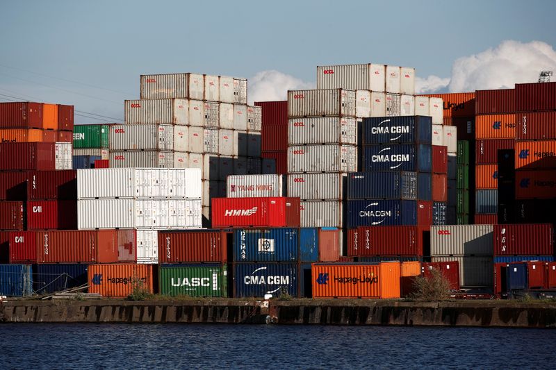 FILE PHOTO: Shipping containers sit stacked in the Port of