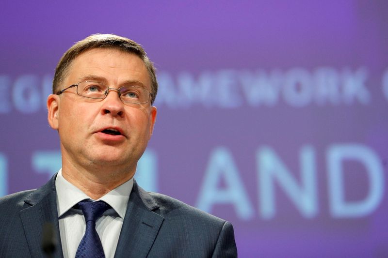 European Commission vice-president Valdis Dombrovskis and Commissioner Nicolas Schmit give