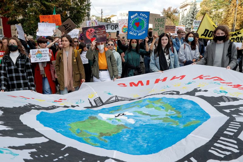FILE PHOTO: Environmental activists hold a rally demanding actions against