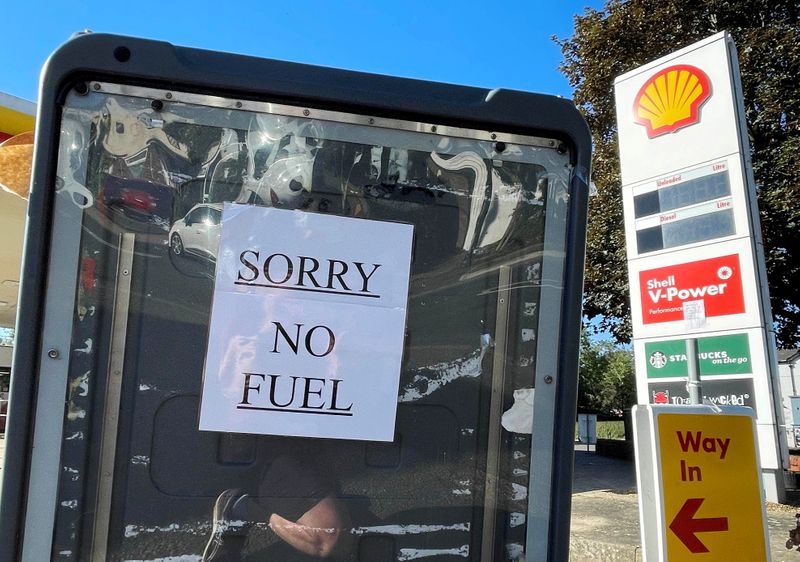 FILE PHOTO: A sign informs customers that fuel has run