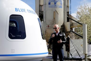 FILE PHOTO: Amazon and Blue Origin founder Jeff Bezos addresses