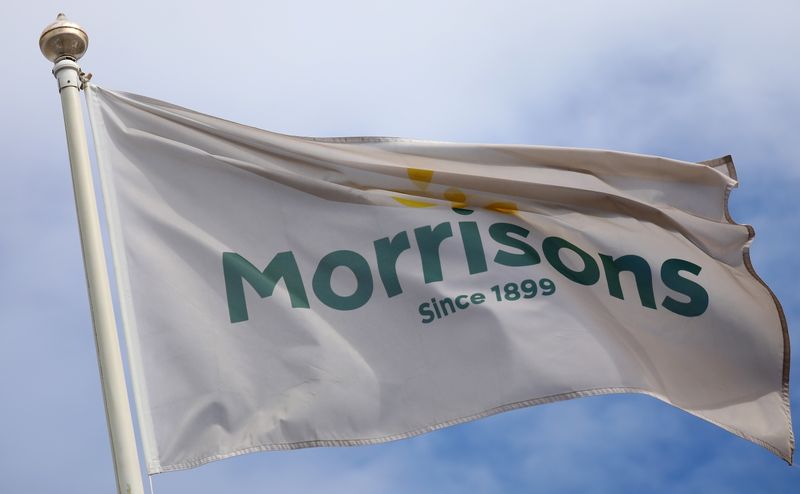FILE PHOTO: A flag flies outside a Morrisons supermarket in