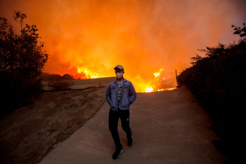 FILE PHOTO: Firefighters tackle the Blue Ridge Fire in Yorba