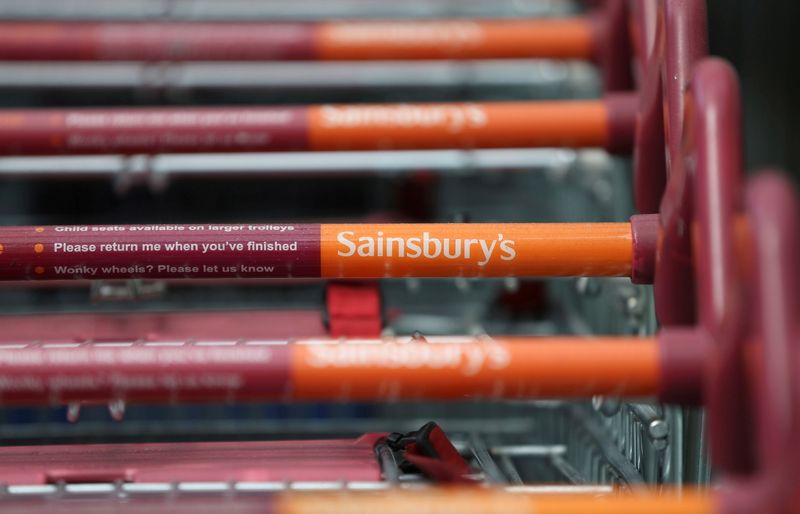 FILE PHOTO: Shopping trolleys at a Sainsbury’s store in London