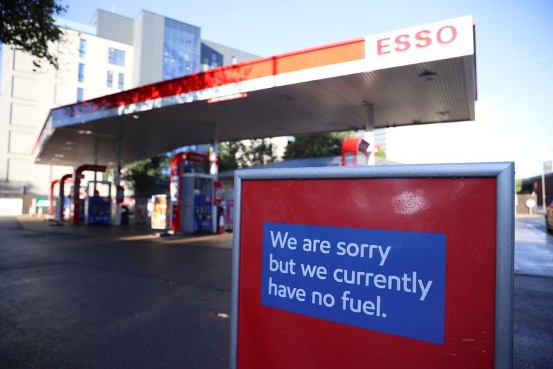 FILE PHOTO: A sign informing customers that fuel has run