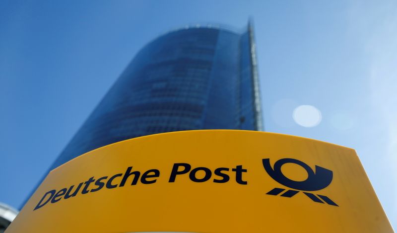 FILE PHOTO: A Deutche Post sign stands in front of