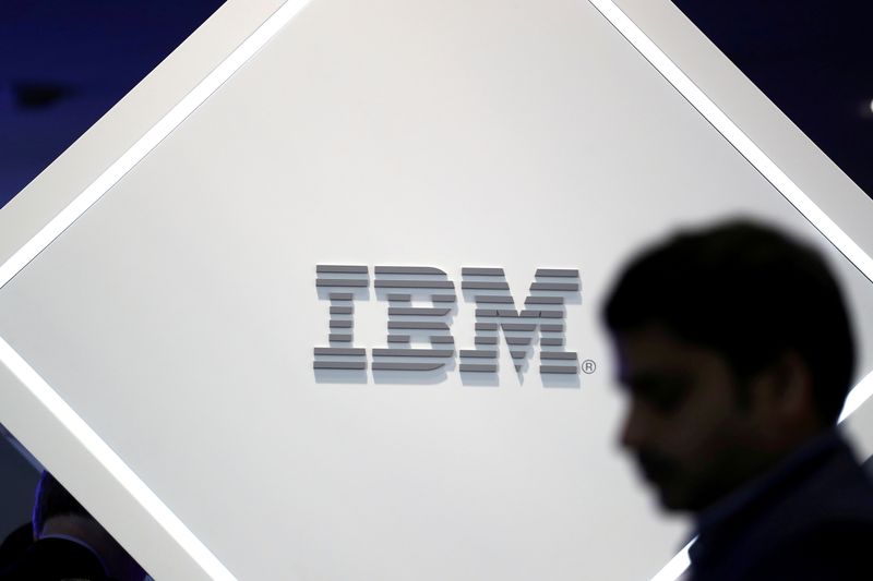FILE PHOTO: FILE PHOTO: A man stands near an IBM