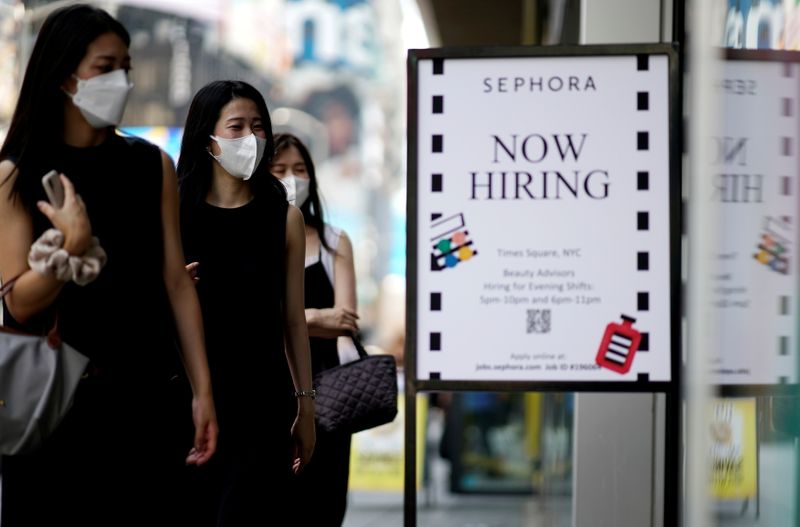 FILE PHOTO: A sign advertising job openings is seen in