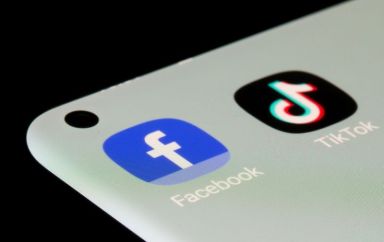 Facebook, TikTok apps are seen on a smartphone in this