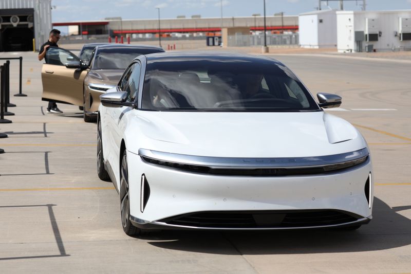 Workers assemble electric vehicles at the Lucid Motors plant in