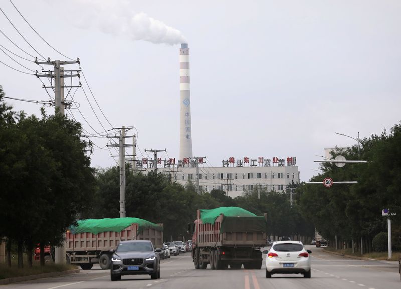 FILE PHOTO: Chimney of a China Energy coal-fired power plant