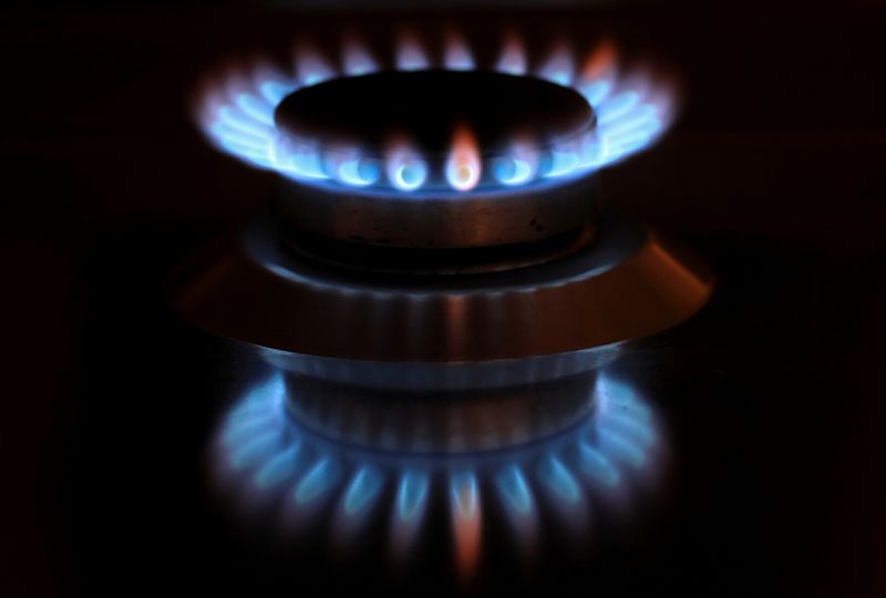 FILE PHOTO: Flames from a gas burner on a cooker