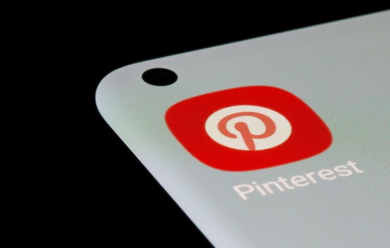 Pinterest app is seen on a smartphone in this illustration