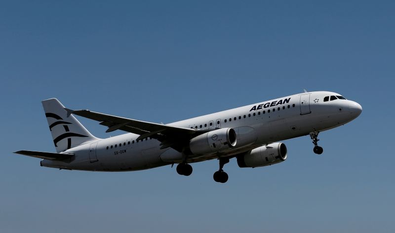 FILE PHOTO: An Aegean Airlines Airbus A320 aircraft takes off