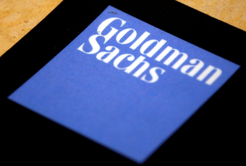 The logo of Goldman Sachs is displayed in their office