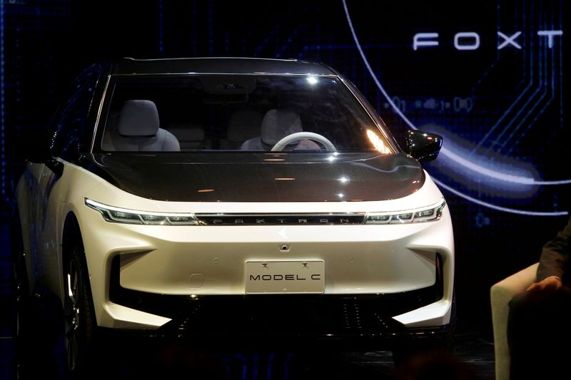 FILE PHOTO: Foxtron electric vehicles unveiled at a Foxconn event