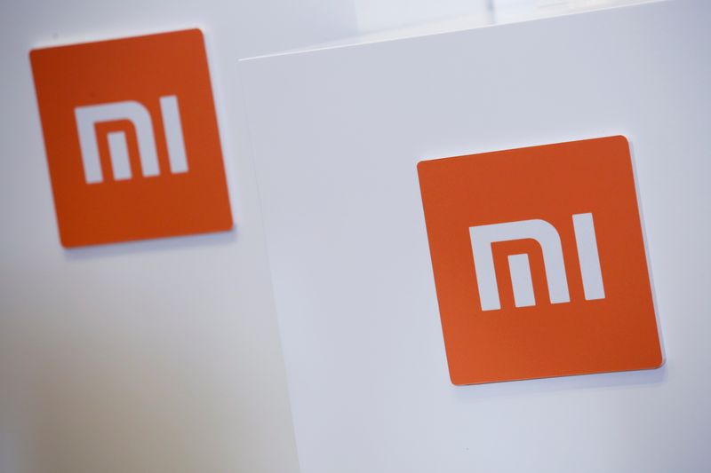 FILE PHOTO: Xiaomi logos are displayed during a news conference