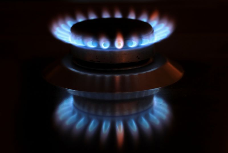 Flames from a gas burner on a cooker are pictured