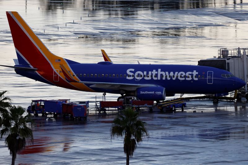 A Southwest Airlines jet sits at a gate at Orlando