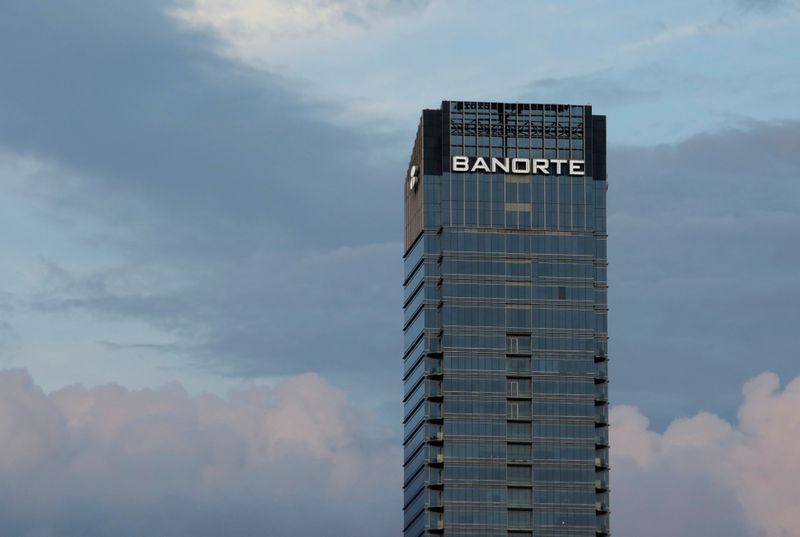 A sign of Banorte bank is seen at the Koi
