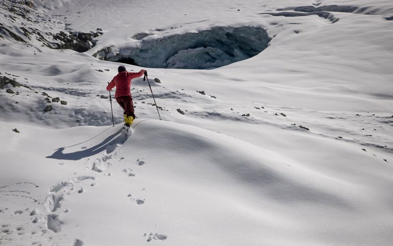FILE PHOTO: Austrian glaciologists explore cavity of disintegrating glacier near