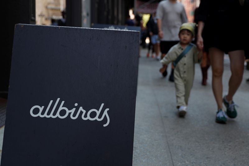A sign on the entrance to the Allbirds flagship store