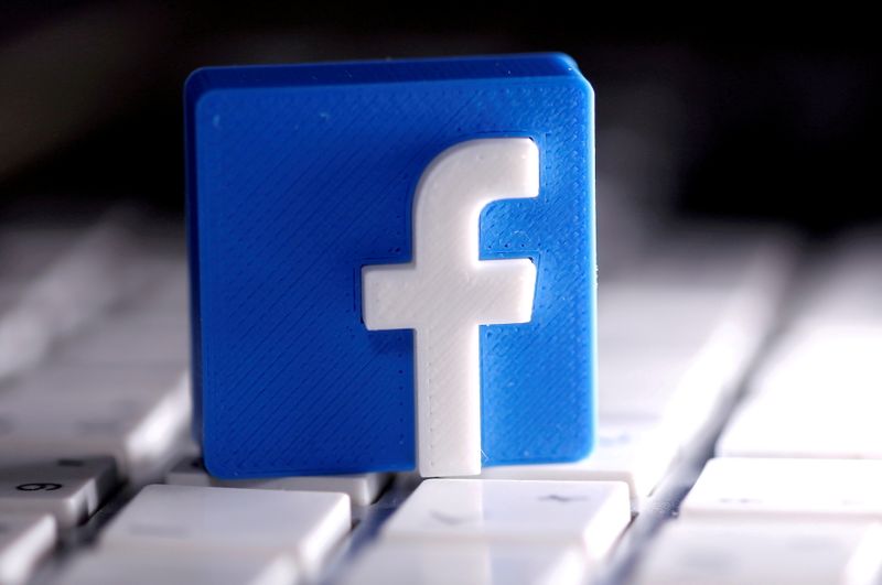FILE PHOTO: FILE PHOTO: A 3D-printed Facebook logo is seen