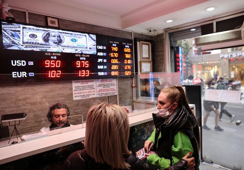 People buy and sell money at a currency exchange office