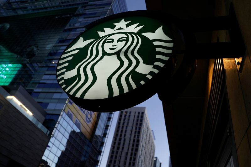 FILE PHOTO: A Starbucks sign is shown on one of