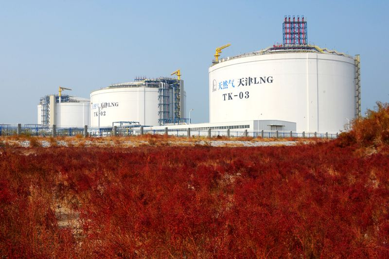 Liquefied natural gas (LNG) storage tanks are seen at the