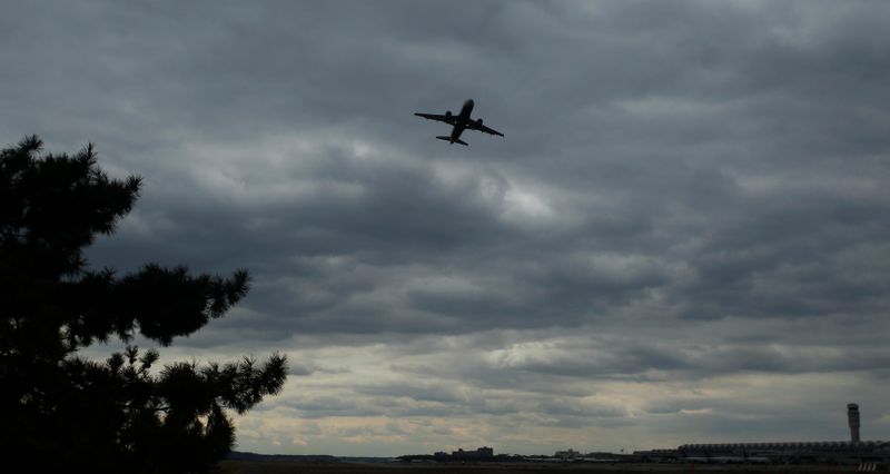 A passenger jet lifts off at Reagan National Airport in
