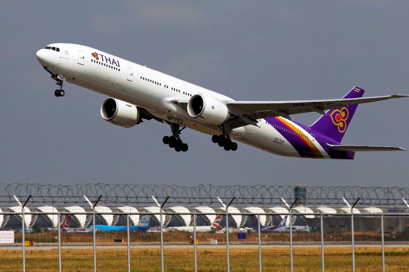 FILE PHOTO: A Thai Airways plane takes off from Bangkok’s