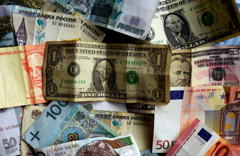 Bank notes of different currencies are photographed in Frankfurt, Germany,