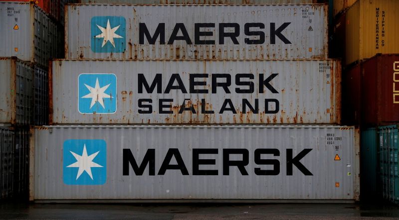 Empty Maersk shipping containers are seen stacked at Peel Ports