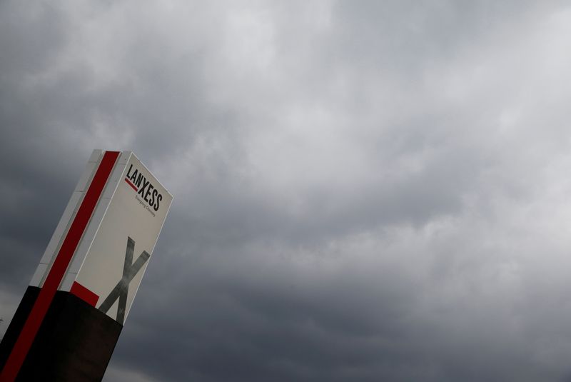 FILE PHOTO: A logo of Lanxess is seen next to
