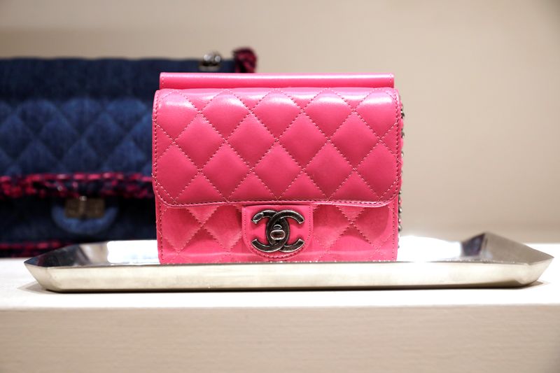 A luxury handbag from Chanel is displayed at The RealReal