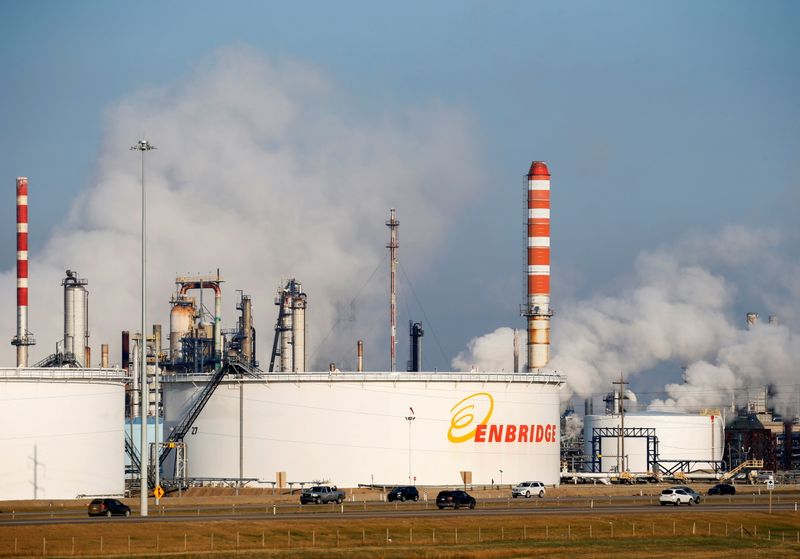 FILE PHOTO: Petrochemical storage tanks are seen at the Enbridge