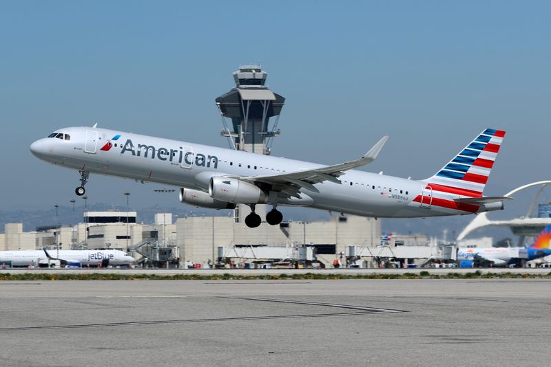 FILE PHOTO: An American Airlines Airbus A321 plane takes off