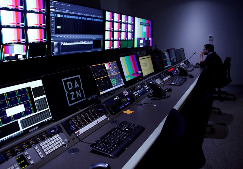 FILE PHOTO: A man works in Internet streaming service DAZN’s