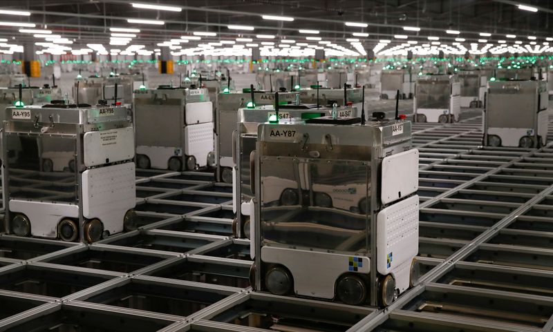 FILE PHOTO: Ocado robots are seen inside a warehouse in