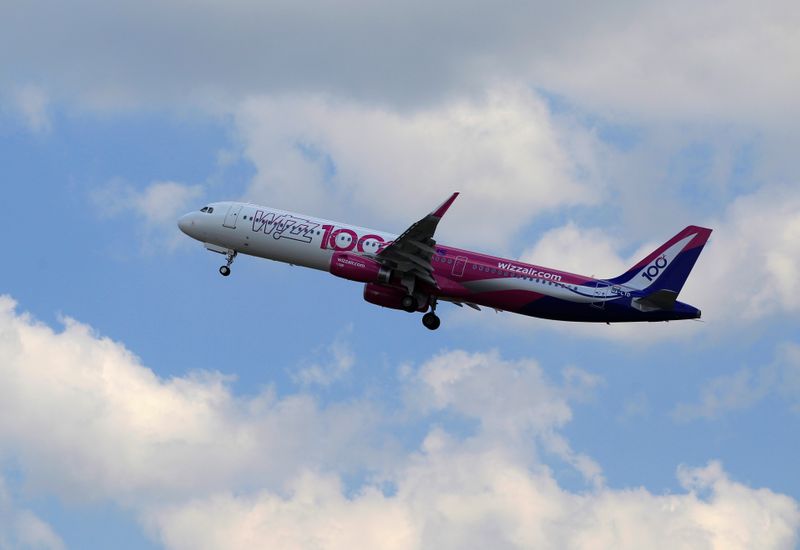 A Wizz Air Airbus A321 aircraft takes off after the