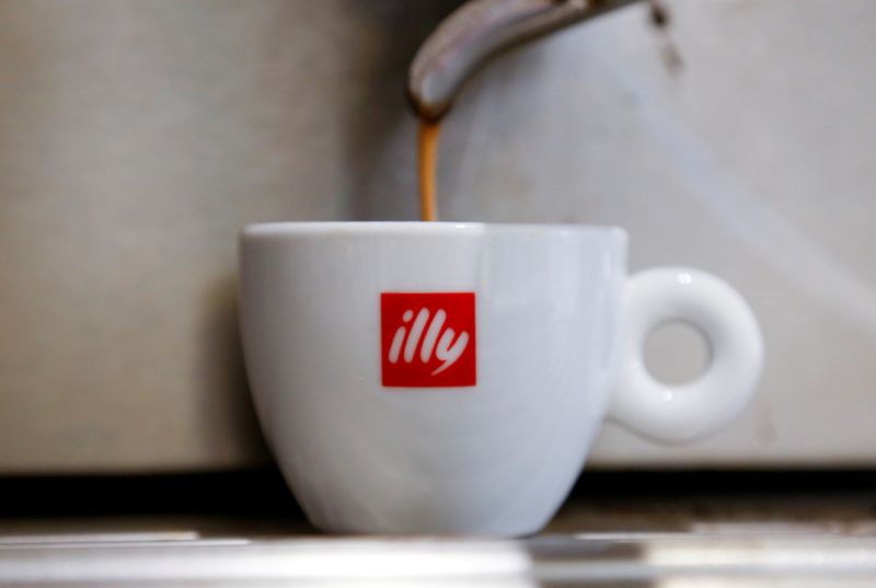 FILE PHOTO: Coffee flows into a Illy cup at a
