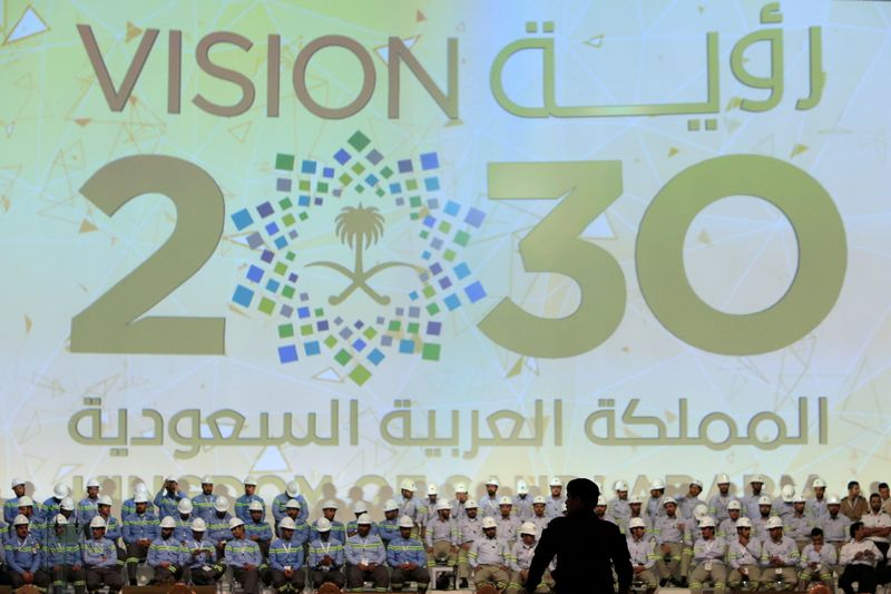 FILE PHOTO: Large banner shows Saudi Vision for 2030 as