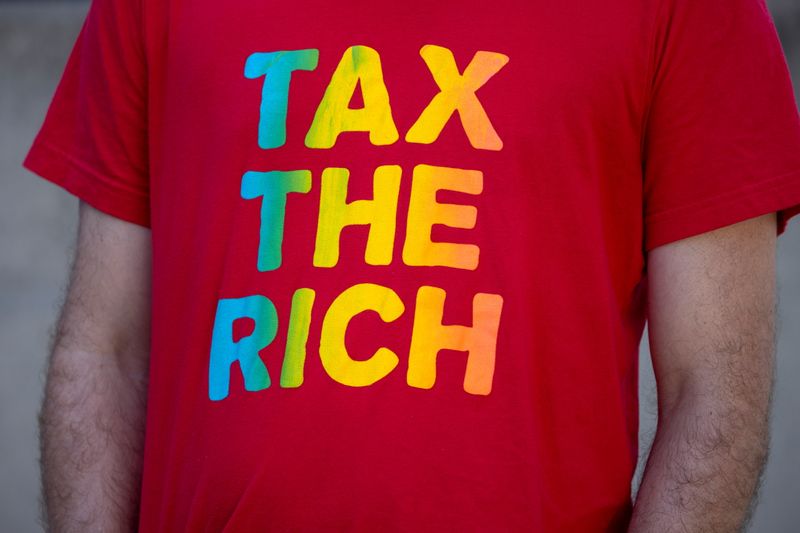 FILE PHOTO: A “Tax the Rich” T shirt is seen