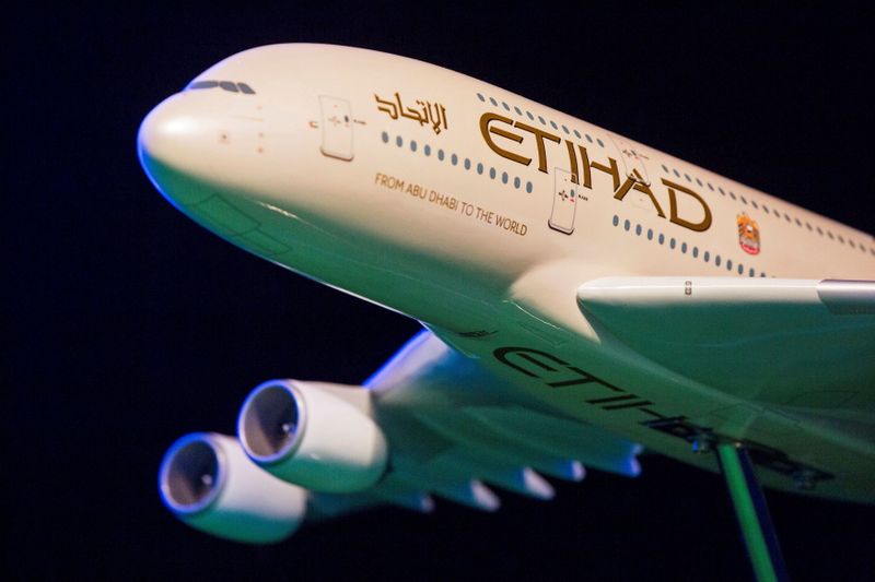 FILE PHOTO: A model Etihad Airways plane is seen in