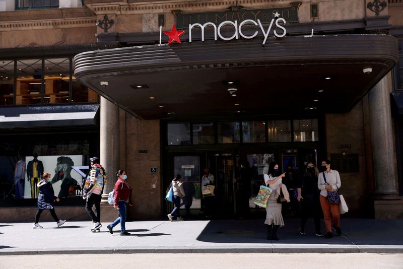FILE PHOTO: Shoppers are seen outside Macy’s in the Manhattan