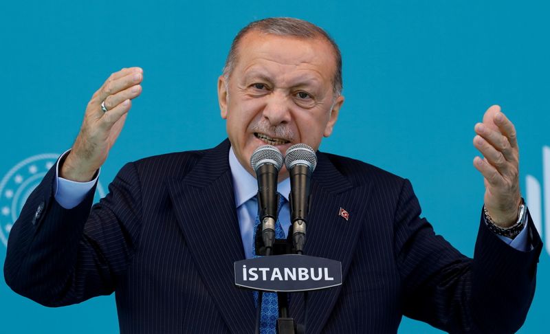 FILE PHOTO: Turkish President Tayyip Erdogan addresses his supporters during