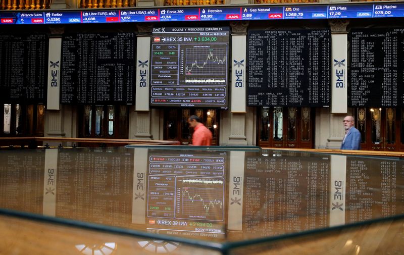 FILE PHOTO: Electronic boards are seen at Madrid stock exchange