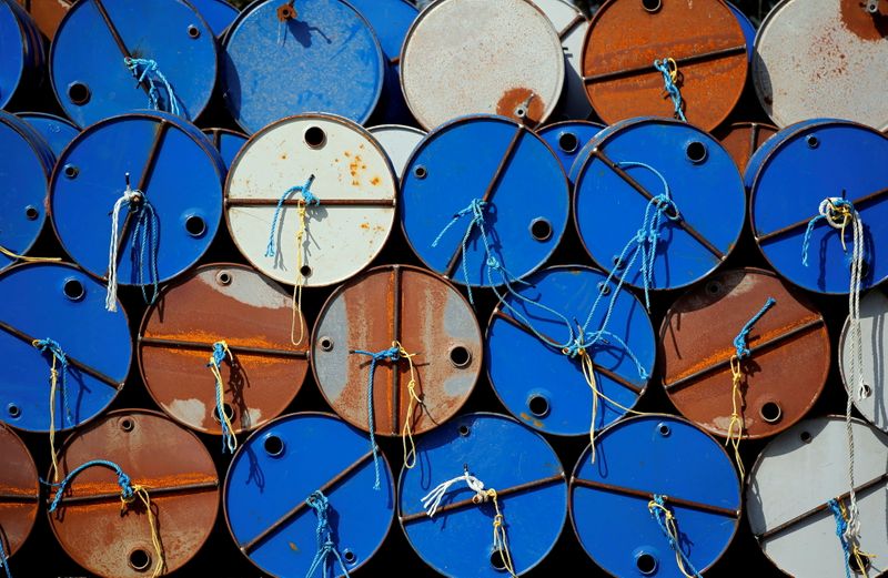 FILE PHOTO: Oil barrels are pictured at the site of
